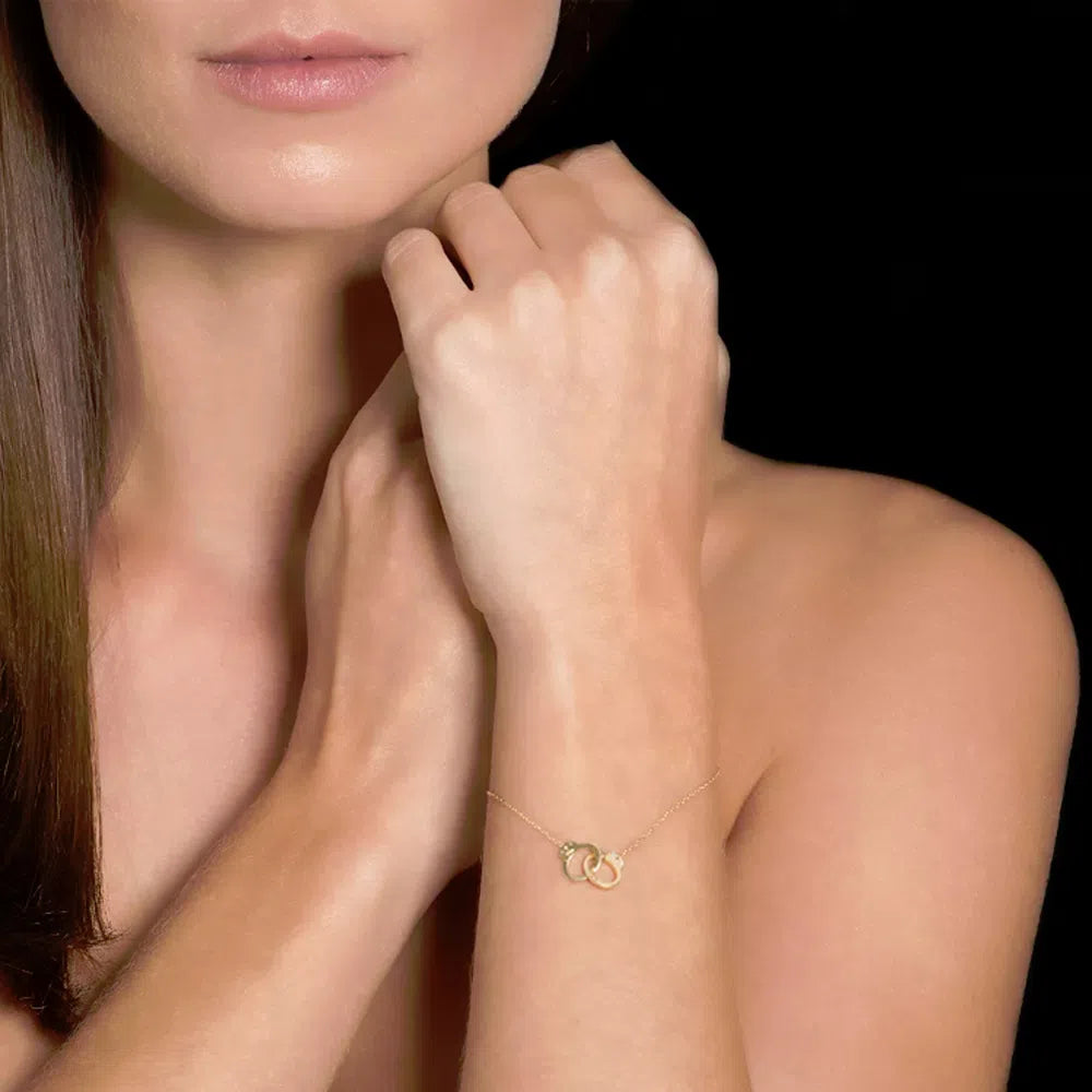 HANDCUFF BRACELET IN 18K YELLOW GOLD WITH DIAMOND.